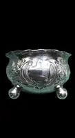 Servizio di 4 saliere in argento con decori floreali e rocaille  con scatola originale.