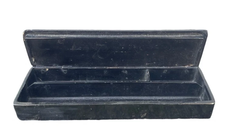 A papier-mâché box depicting a school battalion.