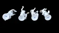 A series of four porcelain musicians seated on columns.