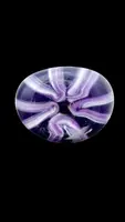 Amethyst-purple glass vase with etched, milky-white vertical bands. Dino Martens.