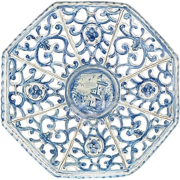 An octagonal plate made of openwork majolica with a monochrome blue rocaille design