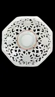 An octagonal plate made of openwork majolica with a monochrome blue rocaille design