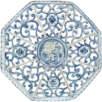 An octagonal plate made of openwork majolica with a monochrome blue rocaille design