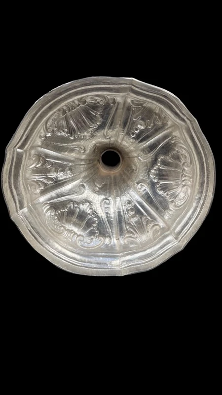 Embossed silver chalice with a tapered globular body decorated with grape cluster motifs