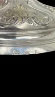 Embossed silver chalice with a tapered globular body decorated with grape cluster motifs