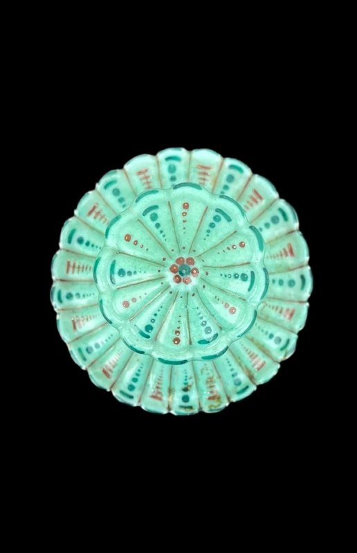 Oriental-inspired polychrome porcelain perfume bottle with a floral basket design