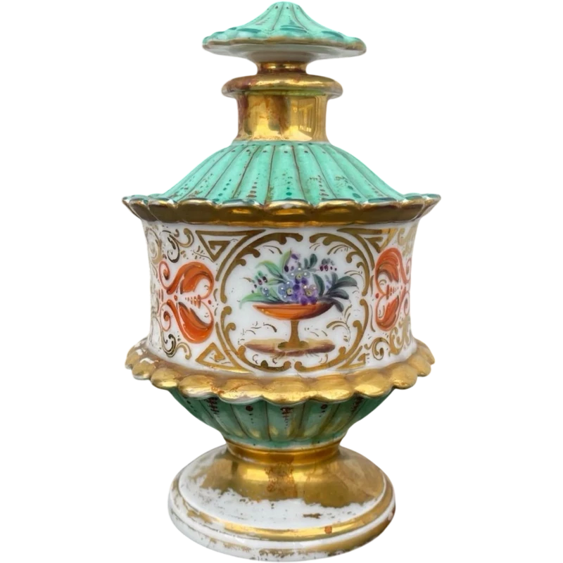 Oriental-inspired polychrome porcelain perfume bottle with a floral basket design