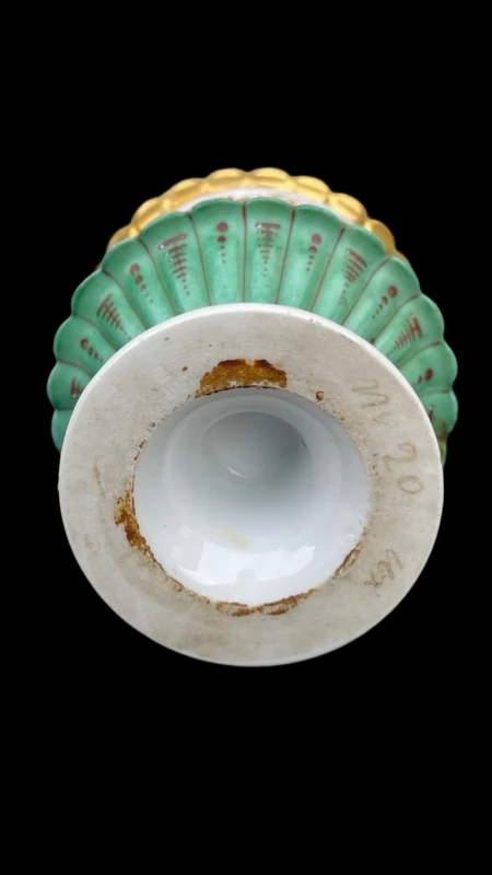Oriental-inspired polychrome porcelain perfume bottle with a floral basket design