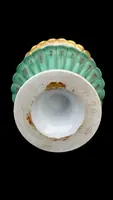 Oriental-inspired polychrome porcelain perfume bottle with a floral basket design