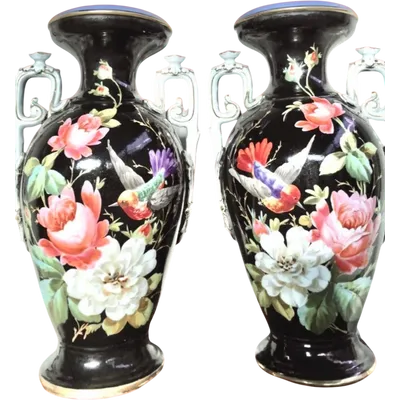 Pair of two-handled vases in polychrome porcelain with floral scenes and small birds. Ginori