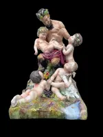 Ensemble en porcelaine polychrome représentant un faune et des putti dans un décor champêtre. Manufacture Ginori.