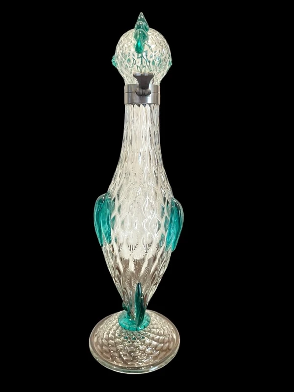 A slightly iridescent aquamarine "balloton" glass bottle. Flavio Poli for Seguso