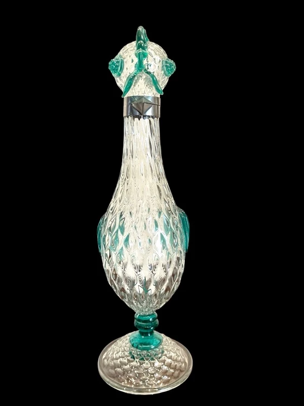A slightly iridescent aquamarine "balloton" glass bottle. Flavio Poli for Seguso
