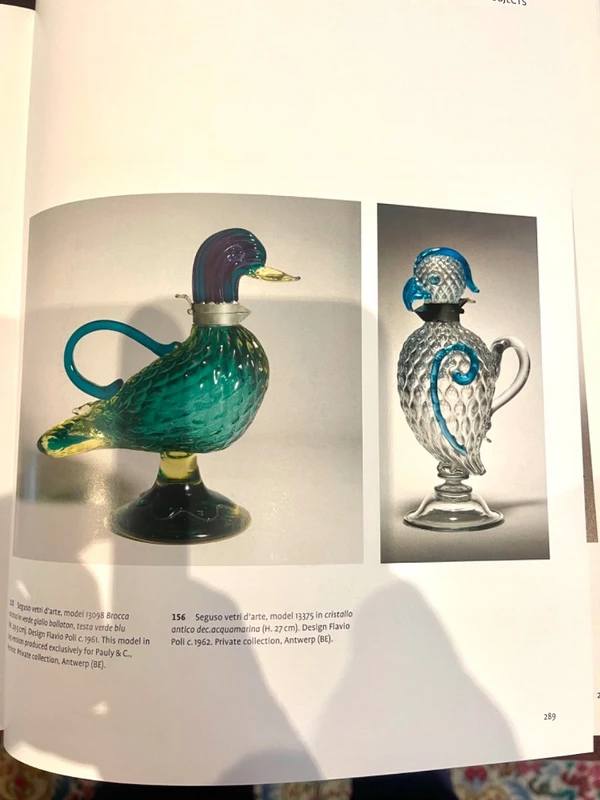 A slightly iridescent aquamarine "balloton" glass bottle. Flavio Poli for Seguso
