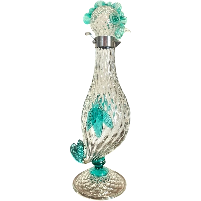 A slightly iridescent aquamarine "balloton" glass bottle. Flavio Poli for Seguso