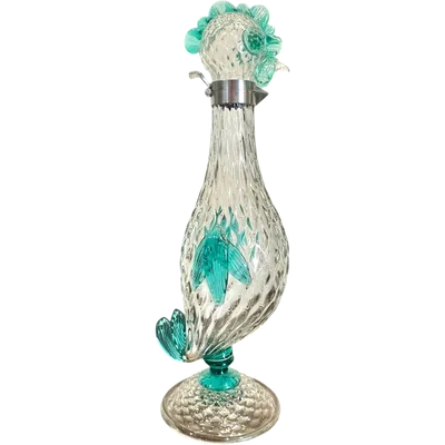 A slightly iridescent aquamarine "balloton" glass bottle. Flavio Poli for Seguso