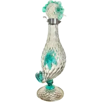 A slightly iridescent aquamarine "balloton" glass bottle. Flavio Poli for Seguso