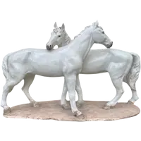 Ceramic sculpture with a base depicting a pair of horses. Made by Mollica.