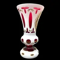 Double-walled, faceted crystal vase with a gilded medallion depicting a folk motif