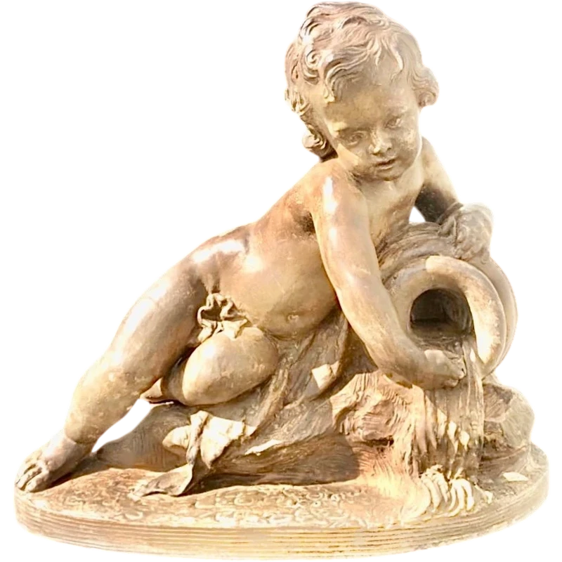 A terracotta sculpture depicting a child pouring liquid from a vase.