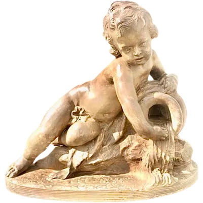 A terracotta sculpture depicting a child pouring liquid from a vase.