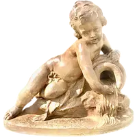 A terracotta sculpture depicting a child pouring liquid from a vase.