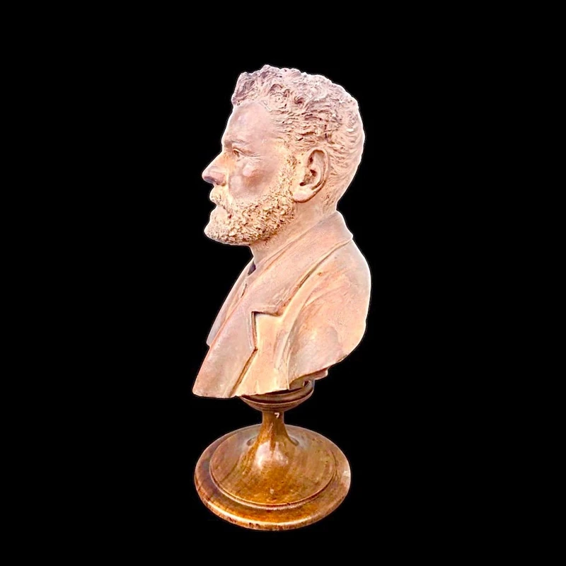 Terracotta bust depicting a young Giosue’ Carducci. Signed: G. Cerrone.
