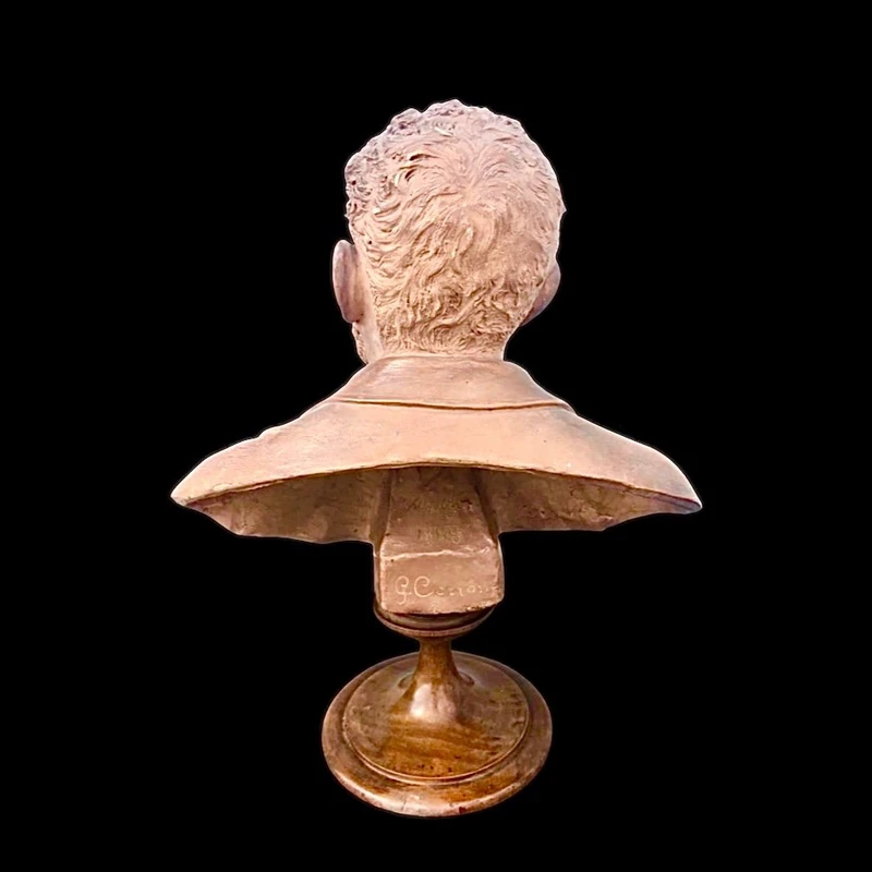 Terracotta bust depicting a young Giosue’ Carducci. Signed: G. Cerrone.