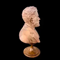 Terracotta bust depicting a young Giosue’ Carducci. Signed: G. Cerrone.
