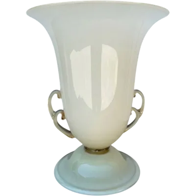 A two-handled, lacteal-amber-colored, double-glazed glass bowl lamp with gold accents.