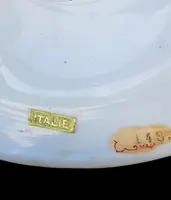 Lampe en forme de coupe en verre doublé de couleur ambre-laiteux, à deux anses, avec des incrustations en or.