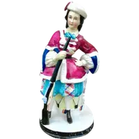Porcelain tobacco box featuring a female figure with a rifle and a drum.