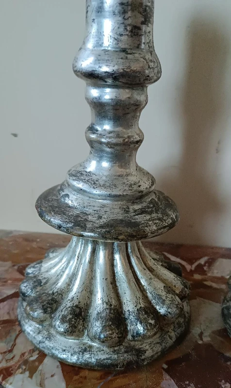 Rara coppia antichi candelieri argentati in terracotta XVII secolo