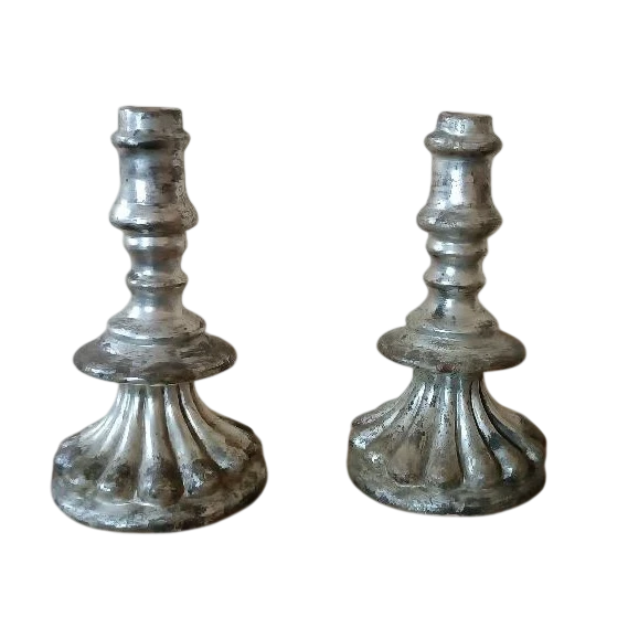 Rara coppia antichi candelieri argentati in terracotta XVII secolo