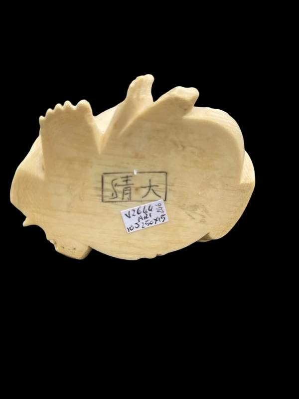 Ivory sculpture depicting Buddha. Signed.