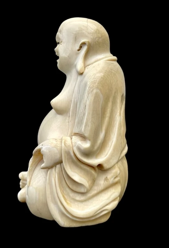 Ivory sculpture depicting Buddha. Signed.