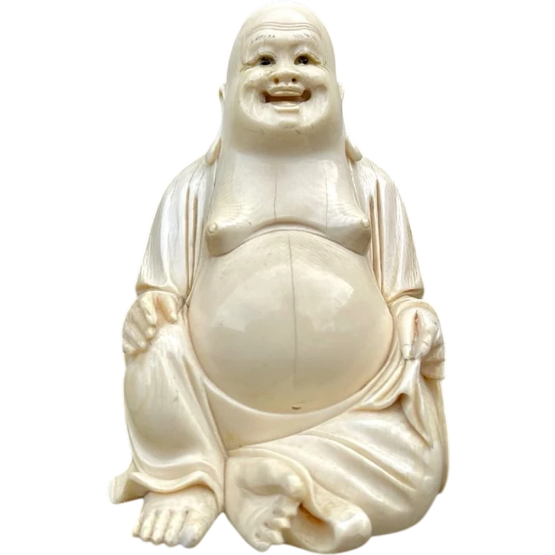 Ivory sculpture depicting Buddha. Signed.