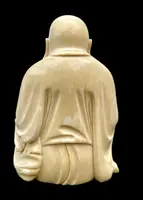 Ivory sculpture depicting Buddha. Signed.