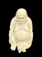 Ivory sculpture depicting Buddha. Signed.