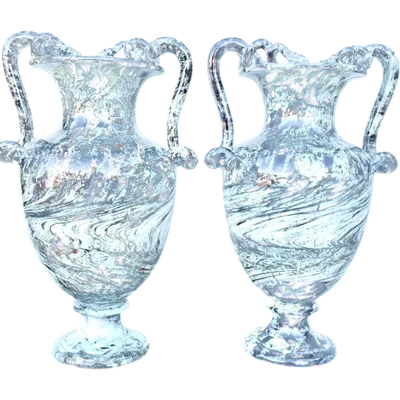 A pair of vases with two serpentine handles and a marbled design.