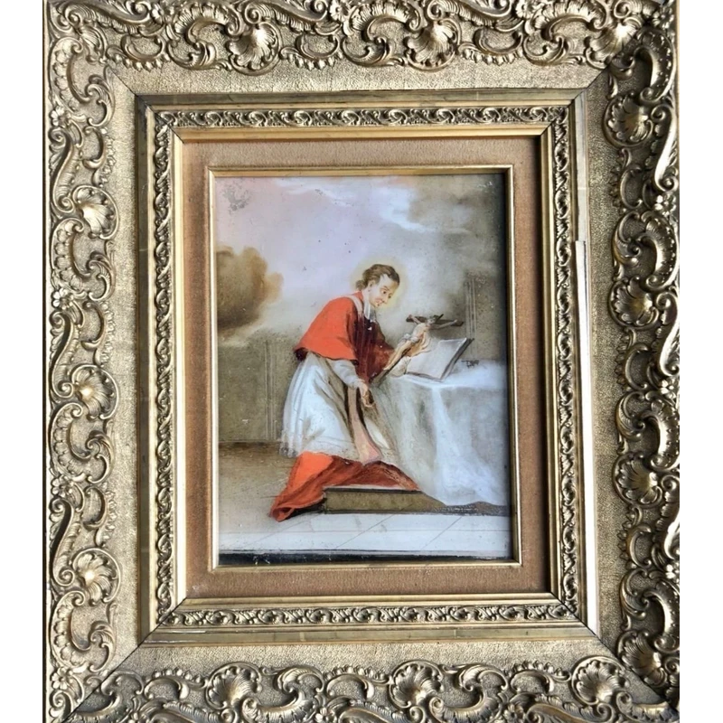 Peinture sur verre représentant saint Louis de Gonzague. Cadre en bois doré orné de motifs rocaille.