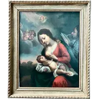 Dipinto olio su tavola con Madonna che allatta Gesu’Bambino.