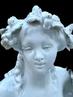 Large porcelain sculpture (masso bastardo) depicting a faun and a nymph with a cherub