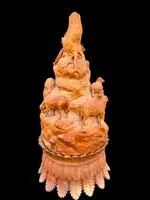 A softwood sculpture depicting a shepherd with sheep