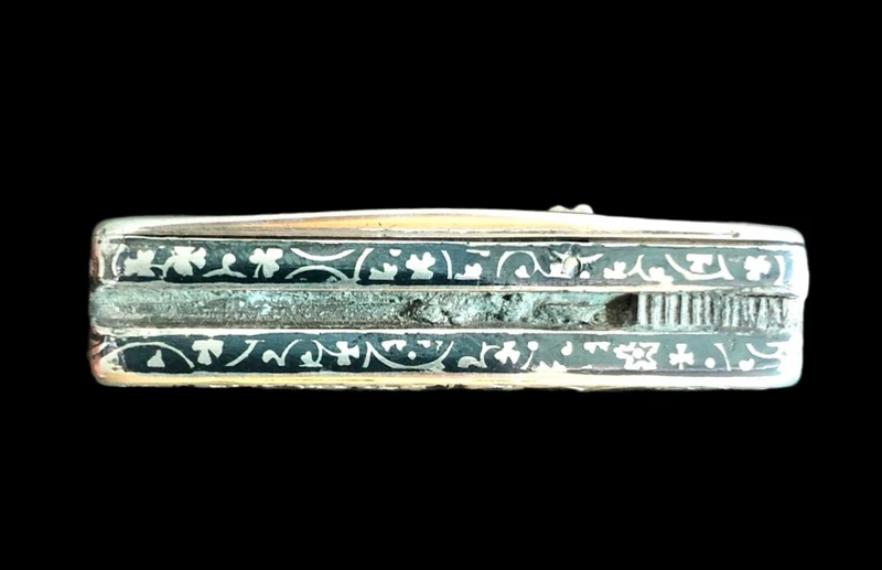 Silver matchbox with engraved floral motifs