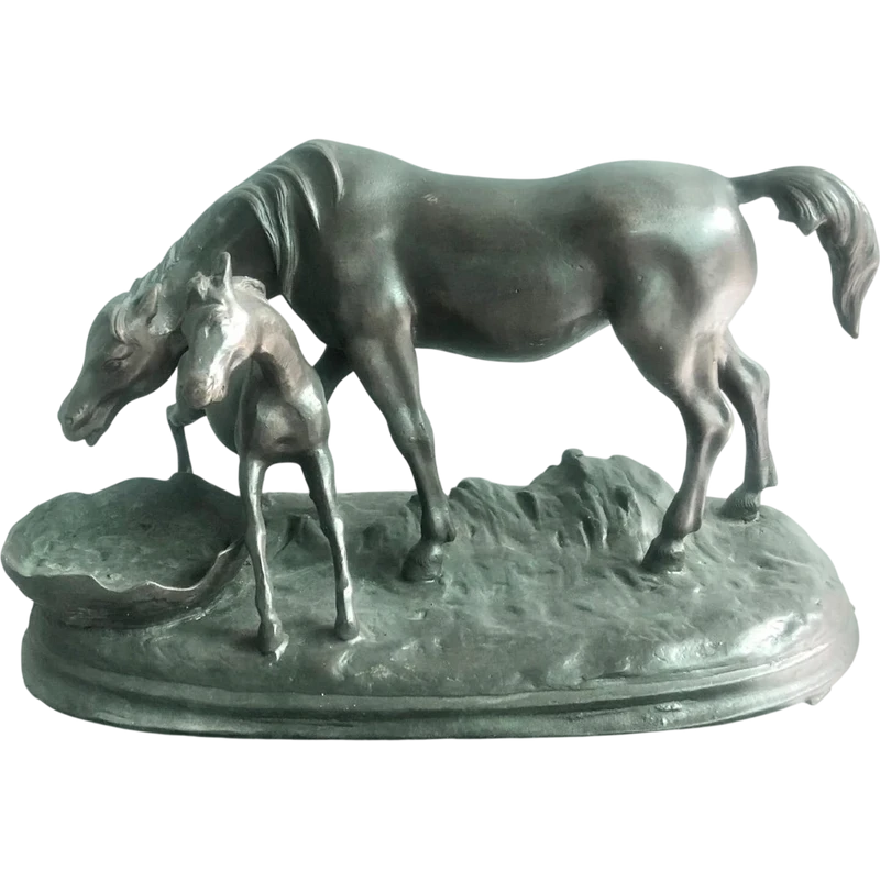 Bronze sculpture depicting a mare with her foal