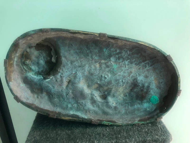 Bronze sculpture depicting a mare with her foal