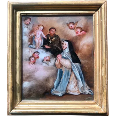 A painting on glass depicting Saint Teresa.