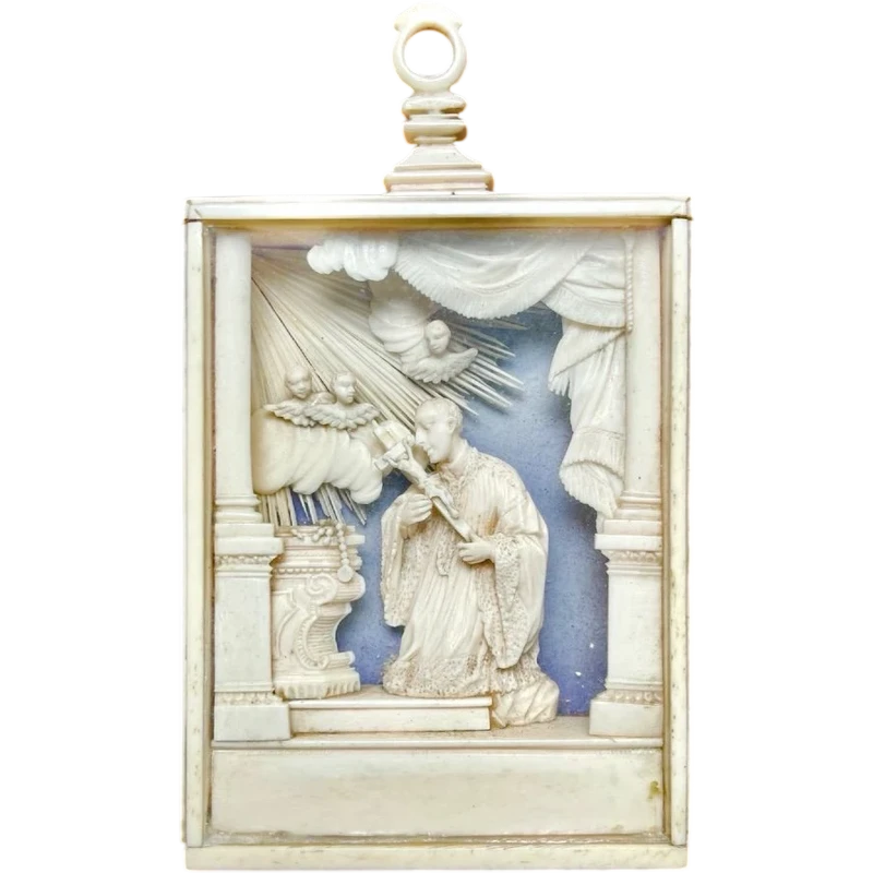 Ivory sculpture in a display case. Trapani, Sicily.
