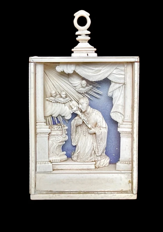 Ivory sculpture in a display case. Trapani, Sicily.
